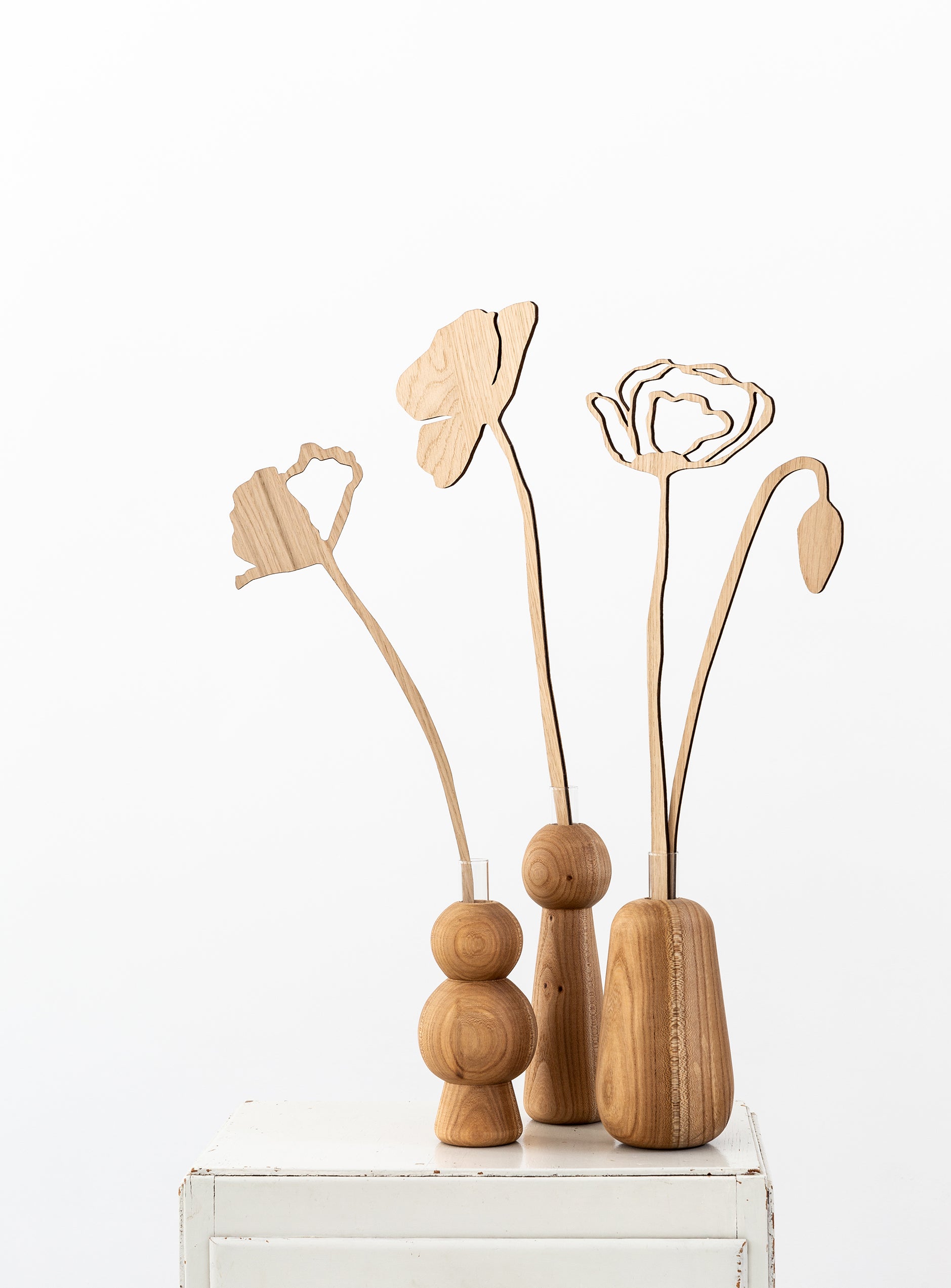 Poppy wood sculpture