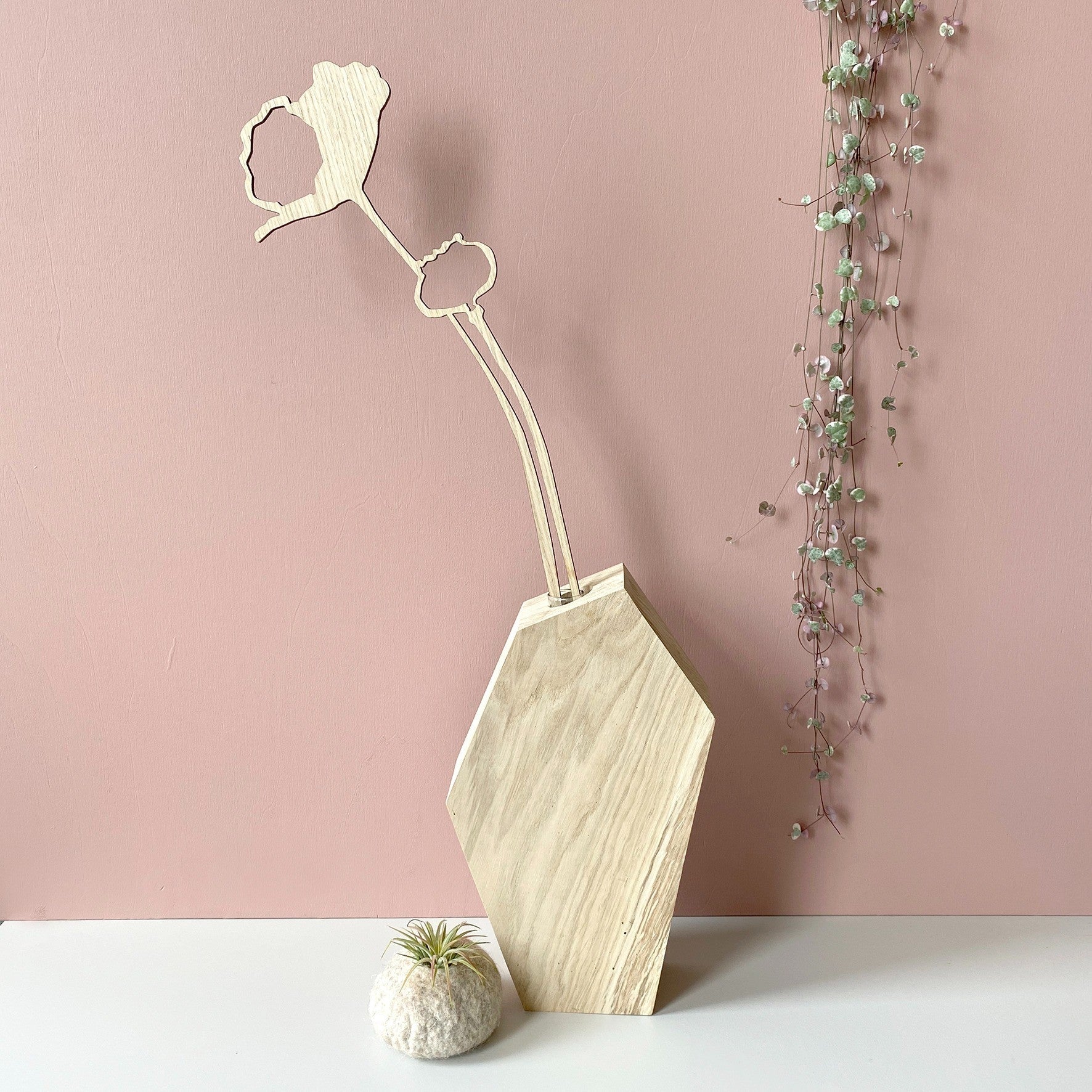 Poppy wood sculpture