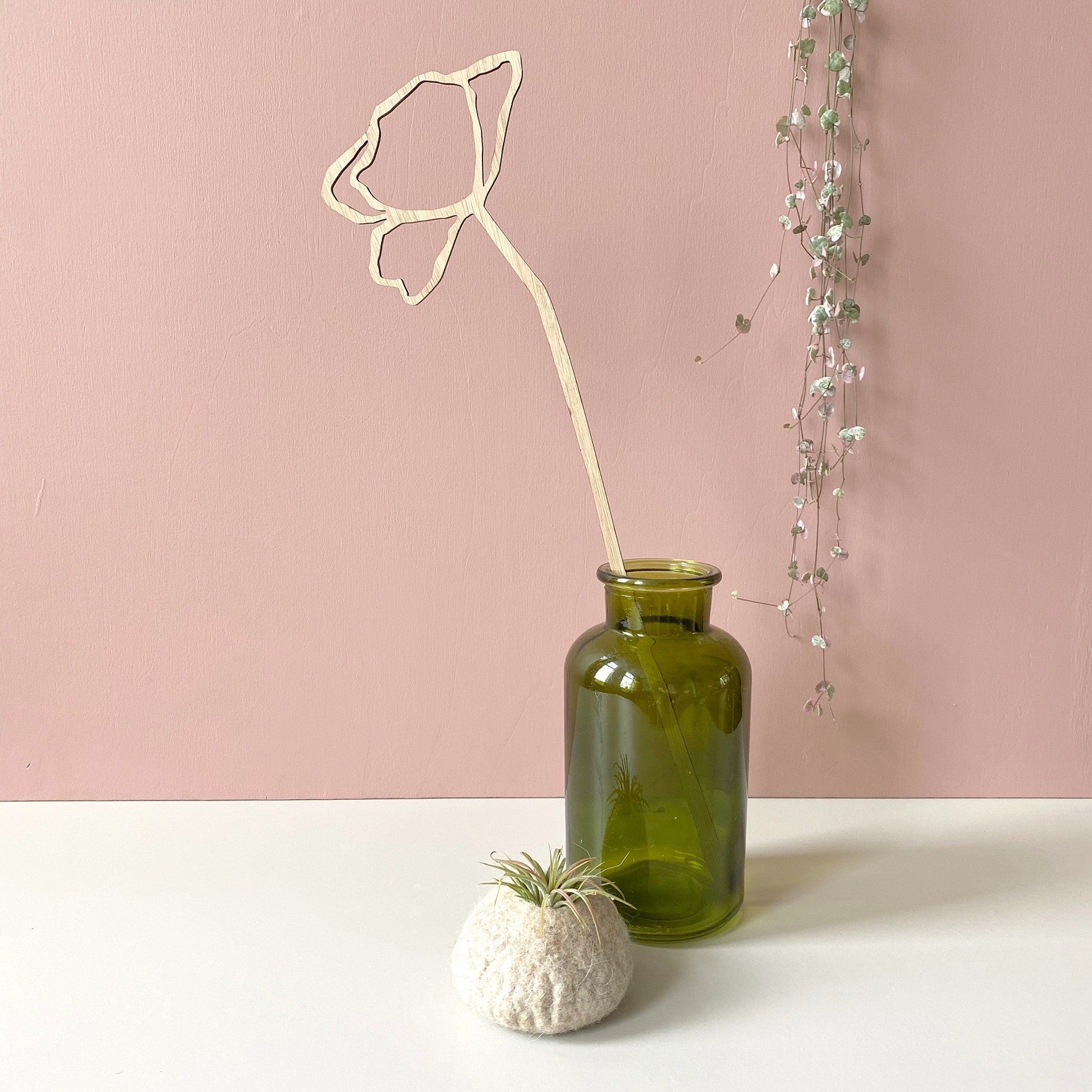 Poppy wood sculpture