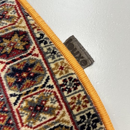 Vintage tapijt donkerblauw/rood/crème/geel van kleur