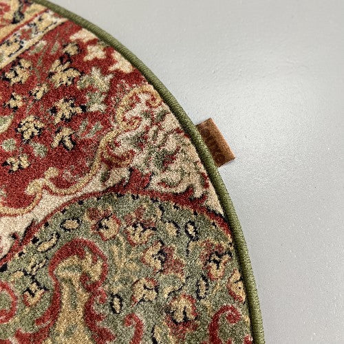 Vintage tapijt terracotta kleur rood, donkerblauw en olijfgroene rand