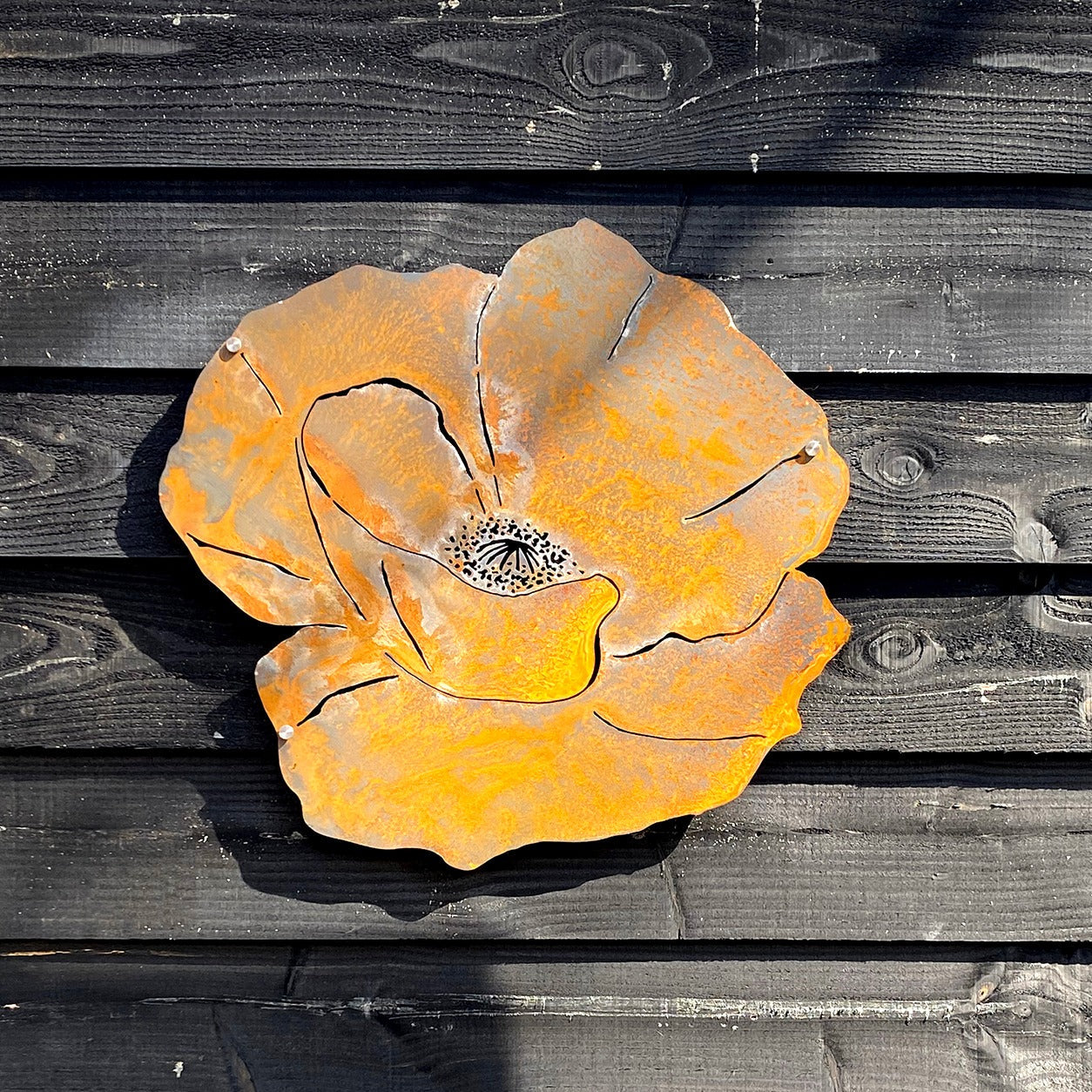 Poppy Cortenstaal - Muurbloem