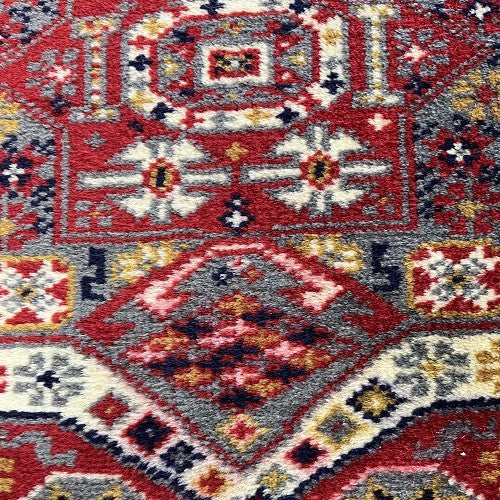 Vintage tapijt donkerblauw/rood/crème/geel van kleur