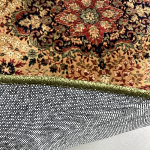 Vintage tapijt terracotta kleur rood, donkerblauw en olijfgroene rand