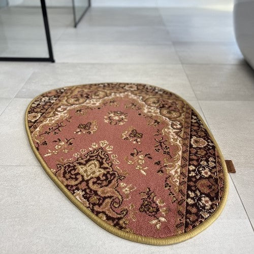 Vintage tapijt roze, okerkleurig