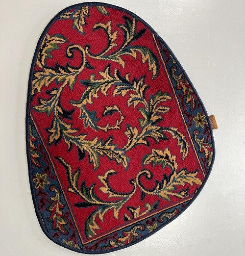 Vintage tapijt warme rood/roze, donkerblauw, oker van kleur