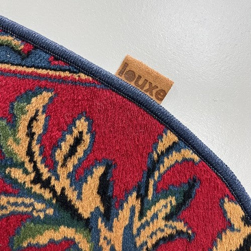 Vintage tapijt warme rood/roze, donkerblauw, oker van kleur